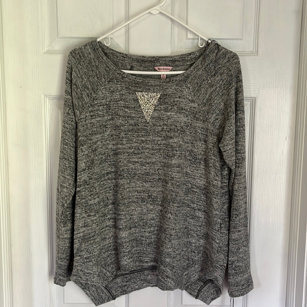 Juicy couture soft sweater with sparkle emblem on rounded neck. New never worn